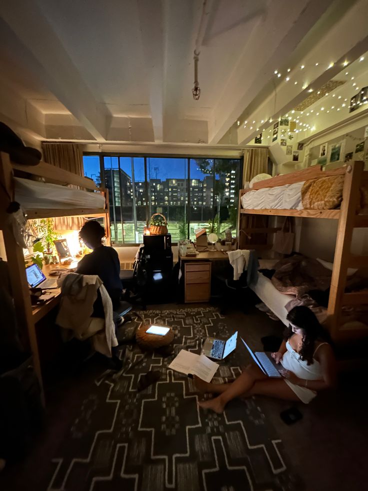 Students studying together in a dorm room